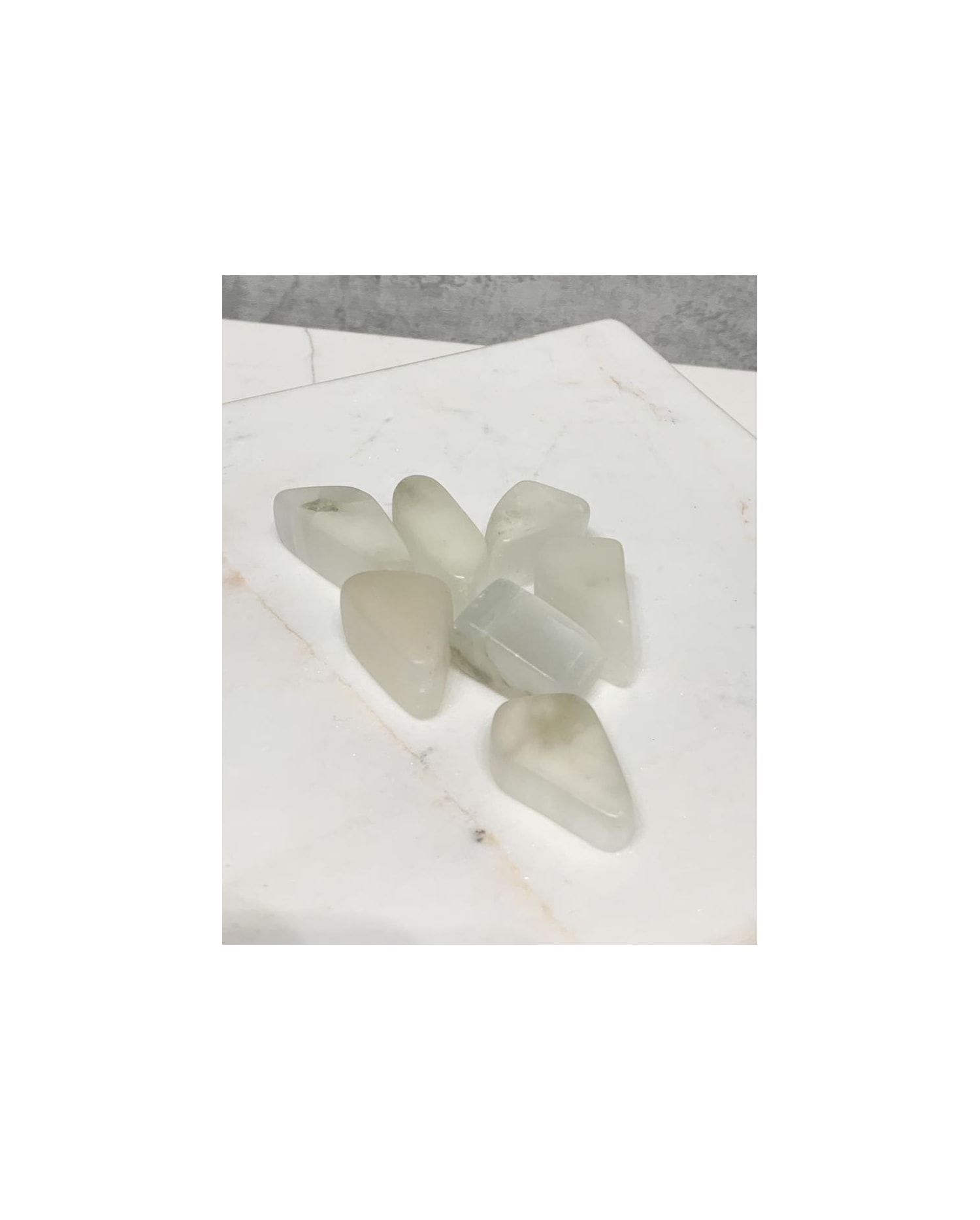 Pedra Ulexita polida rolada 7 a 8 gramas - Shop dos Cristais